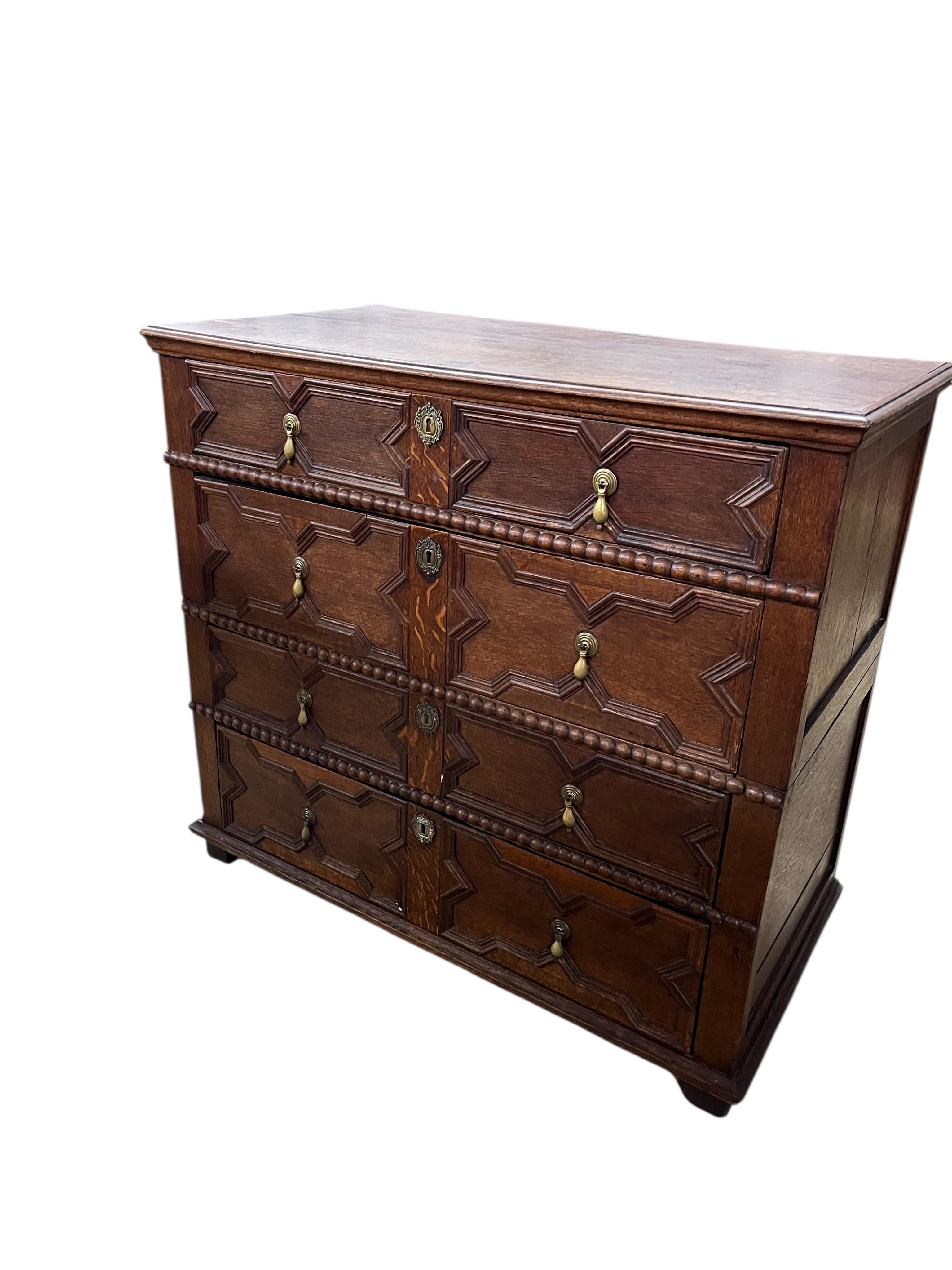 An early 18th century oak two part chest of drawers, width 102cm, depth 53cm, height 93cm
